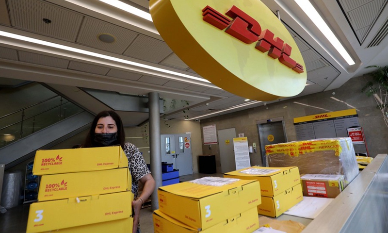 An Israeli worker works at the DHL sorting center in the Airport City near the central Israeli city of Tel Aviv on Nov. 11, 2021.(Photo: Xinhua)