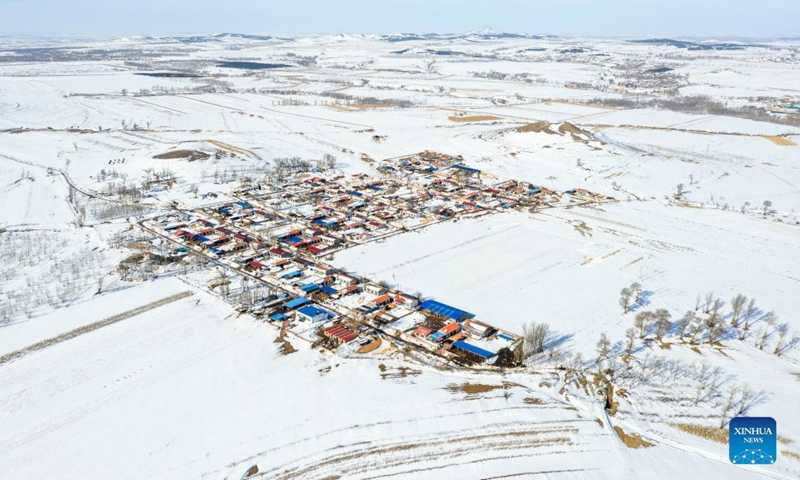 Aerial photo shows a snow-coverd village in Kulun Banner of Tongliao, north China's Inner Mongolia Autonomous Region, Nov. 13, 2021.Photo:Xinhua