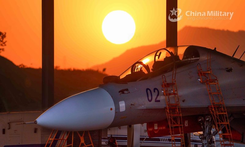 A Su-30 fighter jet attached to a naval aviation brigade under the PLA Eastern Theater Command is well-prepared for a recent round-the-clock flight training exercise. (eng.chinamil.com.cn/Photo by Zhao Ningning and Shentu Linhui)