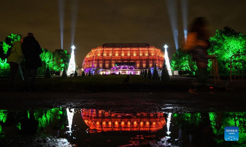 A building is illuminated during the Christmas Garden Berlin light show at Berlin-Dahlem Botanical Garden in Berlin, capital of Germany, Nov. 19, 2021. The Christmas Garden Berlin kicked off on Friday and will last until Jan. 9, 2022. (Photo by Stefan Zeitz/Xinhua)

