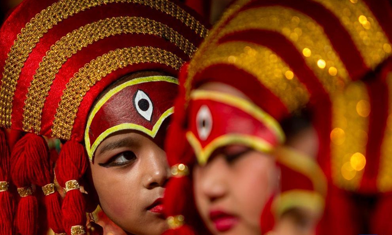 Girls dressed as living goddess Kumari take part in a Hindu holy ritual on the occasion of World Children's Day in Kathmandu, Nepal on Nov. 20, 2021.Photo:Xinhua