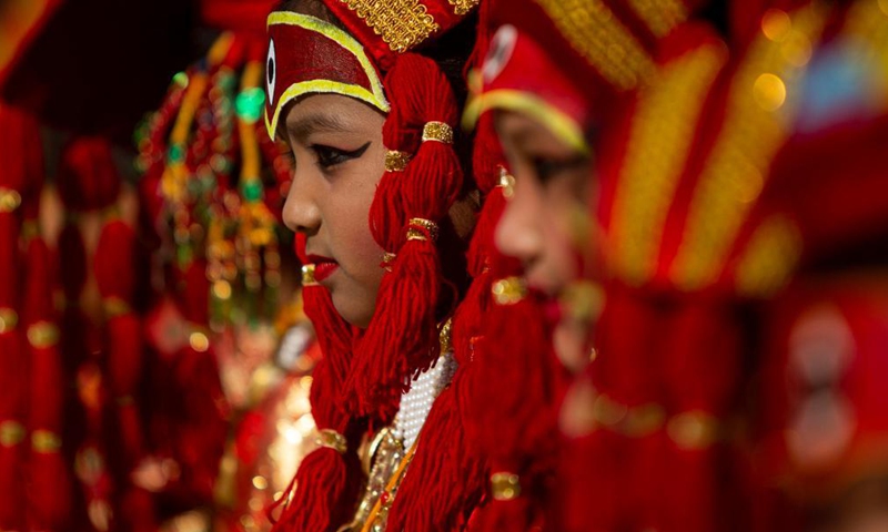 Girls dressed as living goddess Kumari take part in a Hindu holy ritual on the occasion of World Children's Day in Kathmandu, Nepal on Nov. 20, 2021.Photo:Xinhua