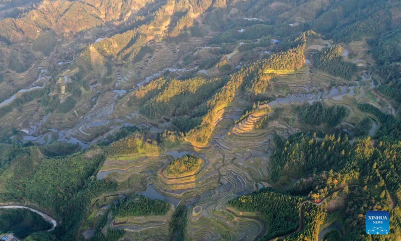 Aerial photo taken on Nov. 25, 2021 shows the winter scenery of Dangjiu Village in Gandong Township of Rongshui Miao Autonomous County, south China's Guangxi Zhuang Autonomous Region.(Photo; Xinhua)