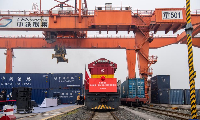 A freight train bound for Lao capital Vientiane is about to set off from southwest China's Chongqing, Dec. 4, 2021.Photo:Xinhua