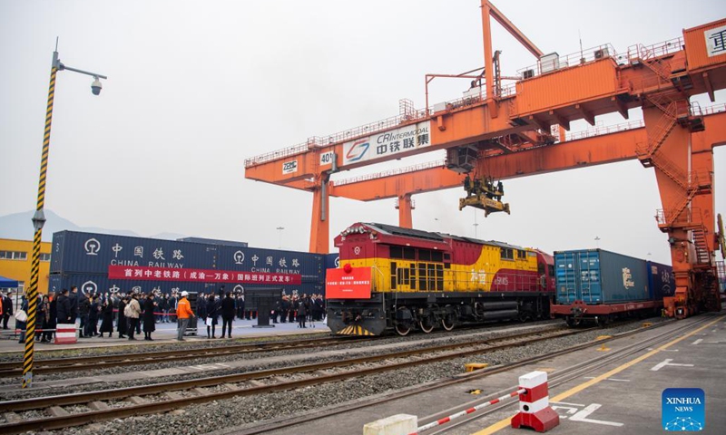 A freight train bound for Lao capital Vientiane is about to set off from southwest China's Chongqing, Dec. 4, 2021.Photo:Xinhua