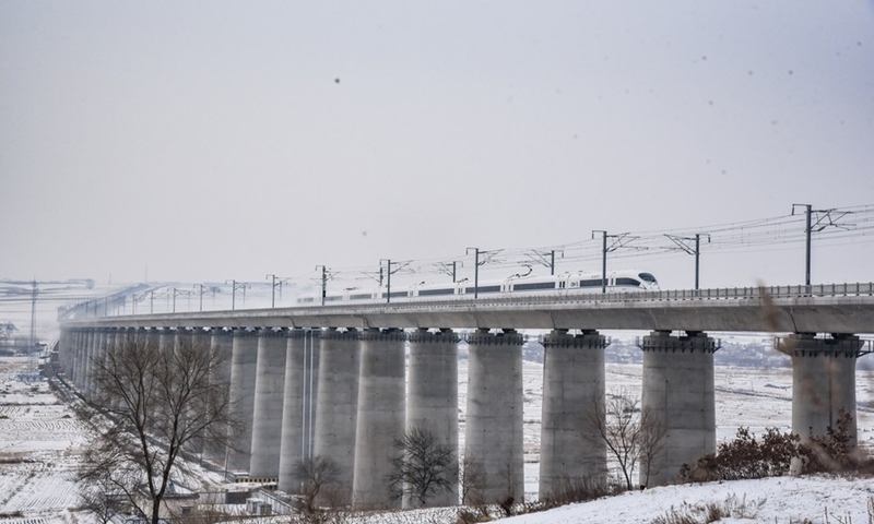 A train runs on the high-speed railway linking the cities of Mudanjiang and Jiamusi in northeast China's Heilongjiang Province, Dec. 6, 2021.(Photo: Xinhua)