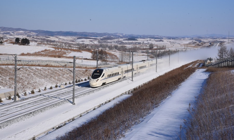 Photo taken on Dec. 4, 2021 shows a train running on the high-speed railway linking the cities of Mudanjiang and Jiamusi in northeast China's Heilongjiang Province during a trail operation.(Photo: Xinhua)