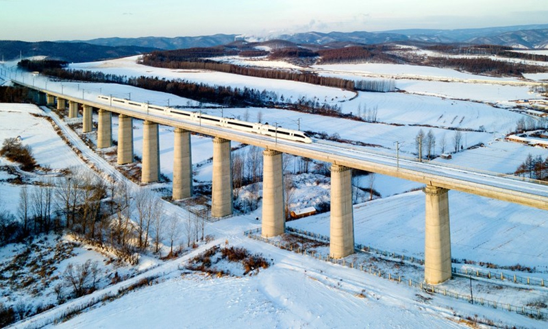 Photo taken on Dec. 2, 2021 shows a train running on the high-speed railway linking the cities of Mudanjiang and Jiamusi in northeast China's Heilongjiang Province during a trail operation.(Photo: Xinhua)