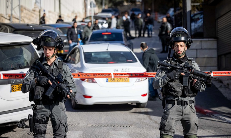 Israeli police officers stand guard at the scene of a stabbing attack in East Jerusalem on Dec. 8, 2021.(Photo: Xinhua)