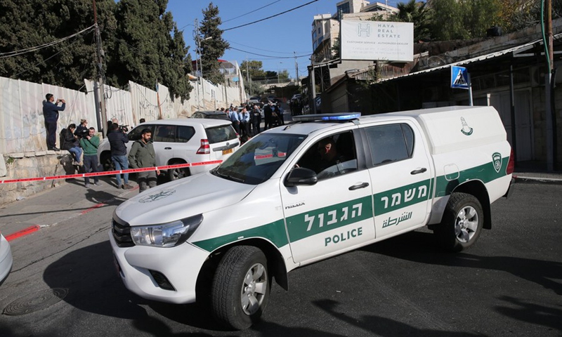 Israeli police officers stand guard near the scene of a stabbing attack at the Sheikh Jarrah neighborhood in East Jerusalem on Dec. 8, 2021.(Photo: Xinhua)