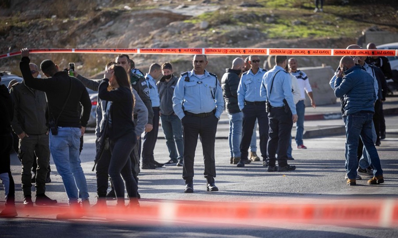 Israeli police officers stand guard at the scene of a stabbing attack in East Jerusalem on Dec. 8, 2021.(Photo: Xinhua)