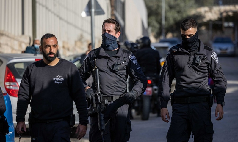 Israeli police officers stand guard at the scene of a stabbing attack in East Jerusalem on Dec. 8, 2021.(Photo: Xinhua)