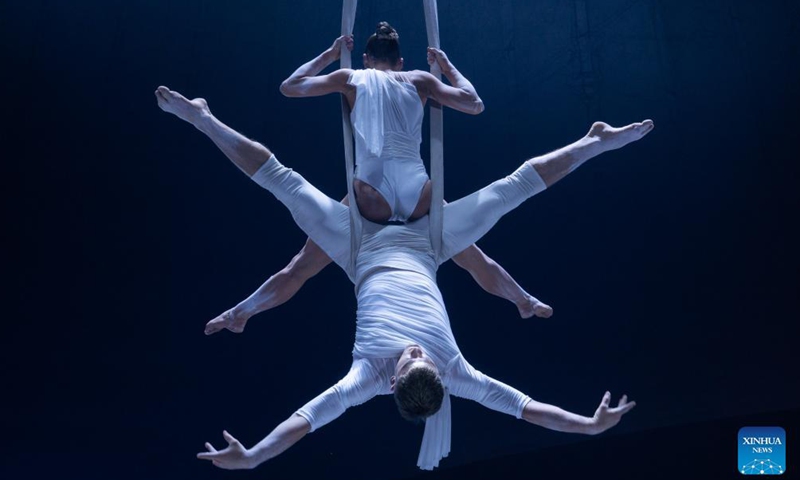 Members of Hungary's contemporary circus company Recirquel perform during their Christmas show Crystal at Mupa in Budapest, Hungary, Dec. 10, 2021.Photo:Xinhua