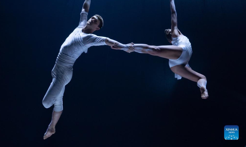 Members of Hungary's contemporary circus company Recirquel perform during their Christmas show Crystal at Mupa in Budapest, Hungary, Dec. 10, 2021.Photo:Xinhua