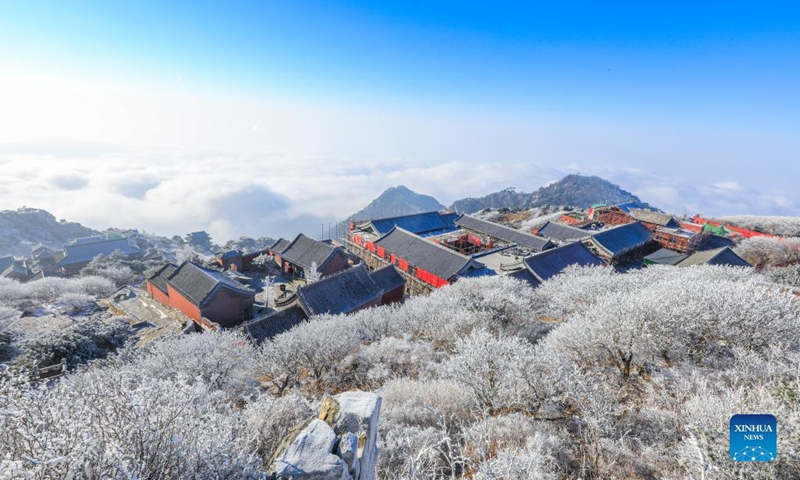 Photo shows rime-covered trees at Taishan Mountain in Tai'an, east China's Shandong Province, Dec. 14, 2021.(Photo: Xinhua)