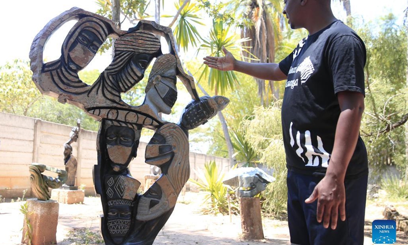 A piece of artwork made by David Ngwerume, one of Zimbabwe's most decorated artists, who is known for his pandemic-inspired art, is seen at his studio in Harare, Zimbabwe, Dec. 9, 2021. Two of Zimbabwe's renowned stone sculptors will showcase their talent at the 9th Beijing International Art Biennale which will start next month.(Photo: Xinhua)