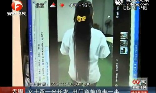 Thief steals woman's hair at crowded job fair - Global Times