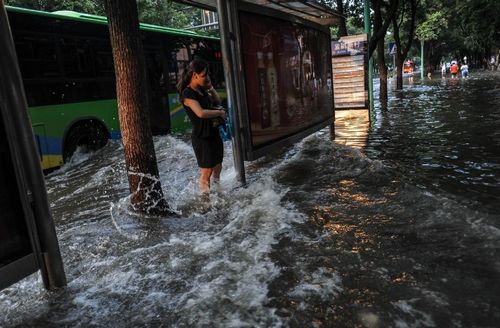 Roads, residential areas waterlogged after torrential rains in Ningbo ...
