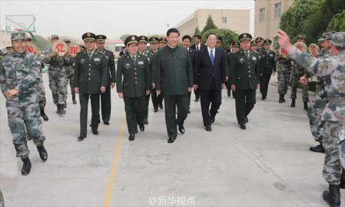 President Xi encourages PLA, armed police on Xinjiang trip - Global Times