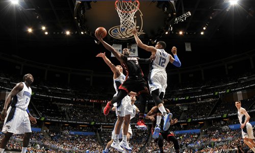 Wade leads Heat in rally win over Magic - Global Times