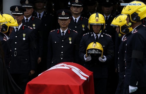 Official funeral held in HK for officer killed in battling fire ...