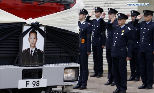 Official funeral held in HK for officer killed in battling fire ...