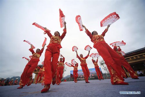 People take part in square dance competition in C China's Hunan ...