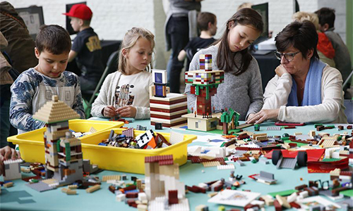 People play with Lego bricks at Lego bricklive convention in Brussels ...