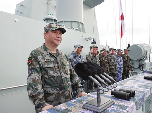 China’s largest maritime military parade showcases aircraft carrier ...