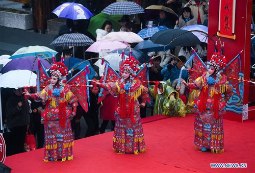 Wooden-bench dragon dance performed to celebrate Chinese Lantern ...