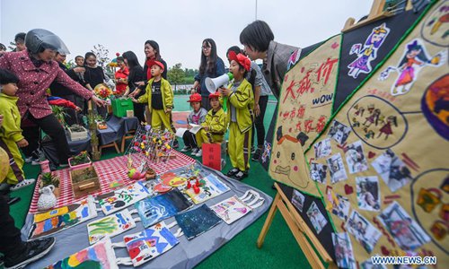 Campus charity bazaar held in Changxing County, E China's Zhejiang ...