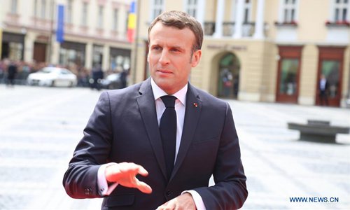 French President Emmanuel Macron arrives in the Grand Square in front of the Sibiu City Hall to attend the European Union (EU) informal summit in Sibiu, Romania, May 9, 2019. The leaders of the EU member states on Thursday agreed on defending one Europe and upholding the rules-based international order in their 10 commitments declaration, made at an informal summit in Sibiu. (Xinhua/Chen Jin)