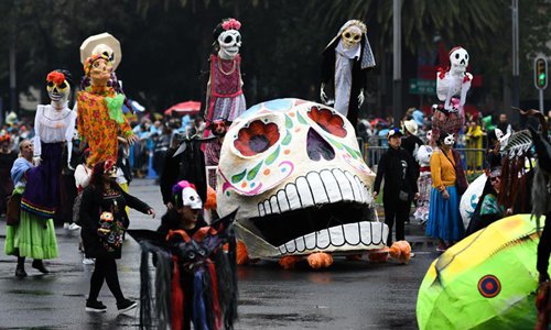 People participate in Day of Dead Parade in Mexico - Global Times