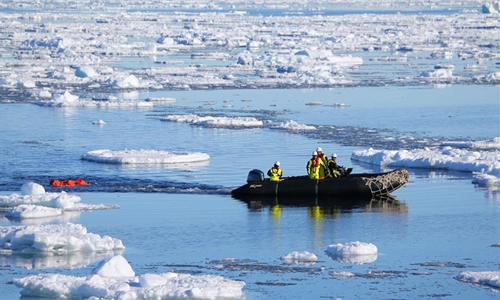 China's 36th Antarctic expedition team work on icebreaker Xuelong 2 ...