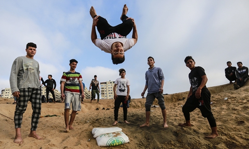 Palestinian youth enjoy parkour - Global Times