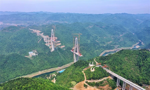 In pics: construction site of Xiangjiang bridge in SW China - Global Times