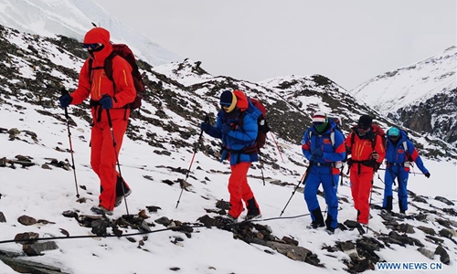 Mt. Qomolangma remeasuring surveyors arrive at base camp at a height of ...