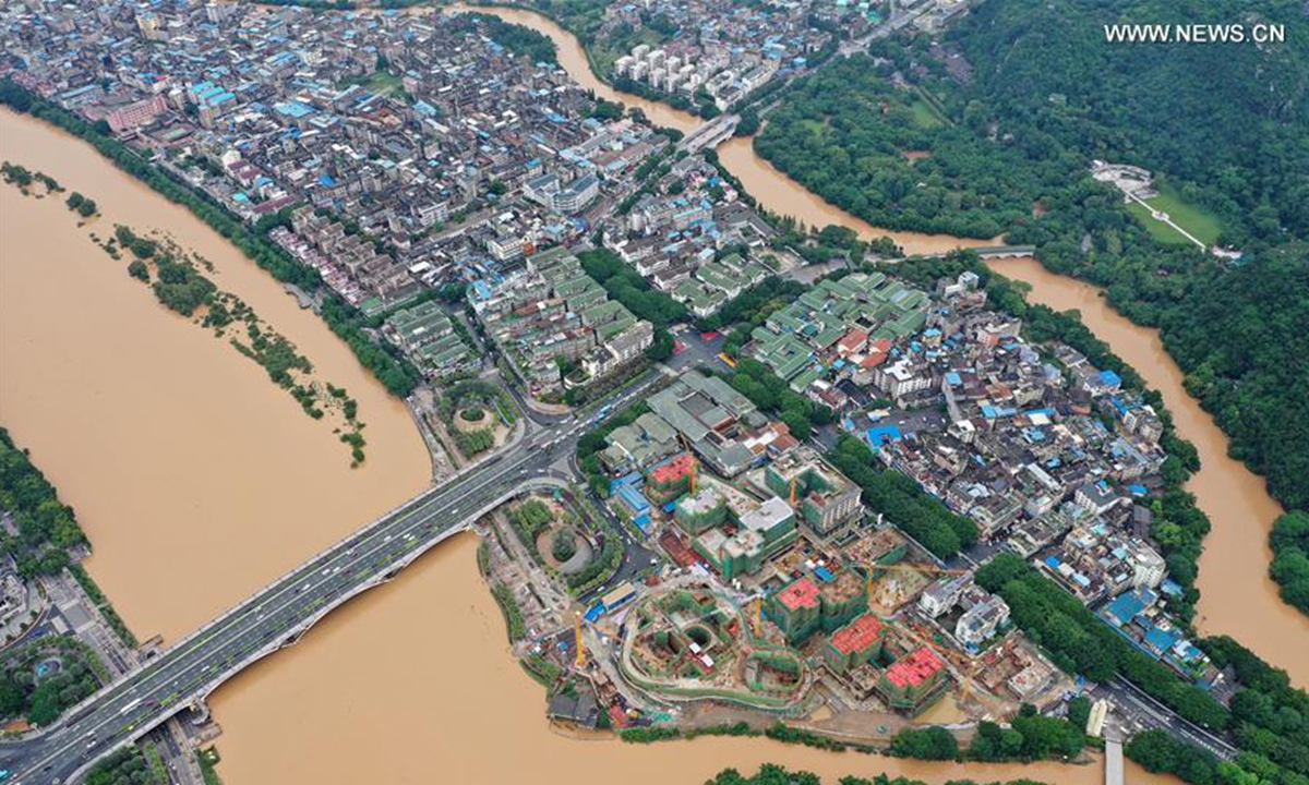 Lijiang River witnesses flood peak due to torrential rain ...