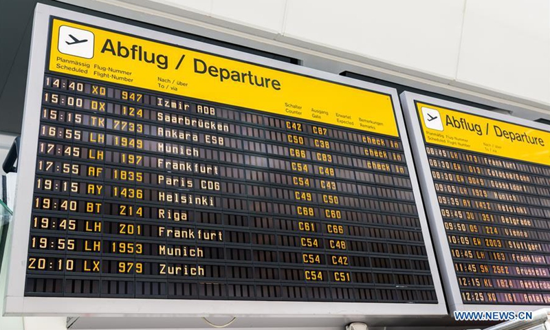 Passengers seen at Berlin Central Train Station as travel warnings ...