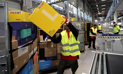 DHL Express halts shipments from China to India after customs delays ...