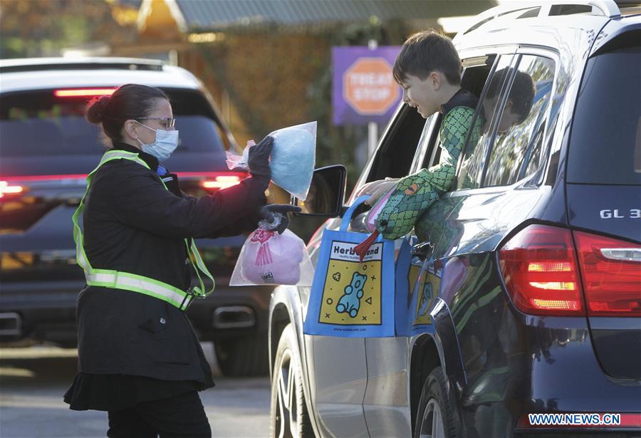 Drive-thru Trick or Treat event held at Pacific National Exhibition in ...