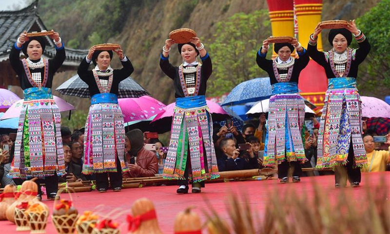 People of Yao ethnic group perform during harvest festival in Guangxi ...