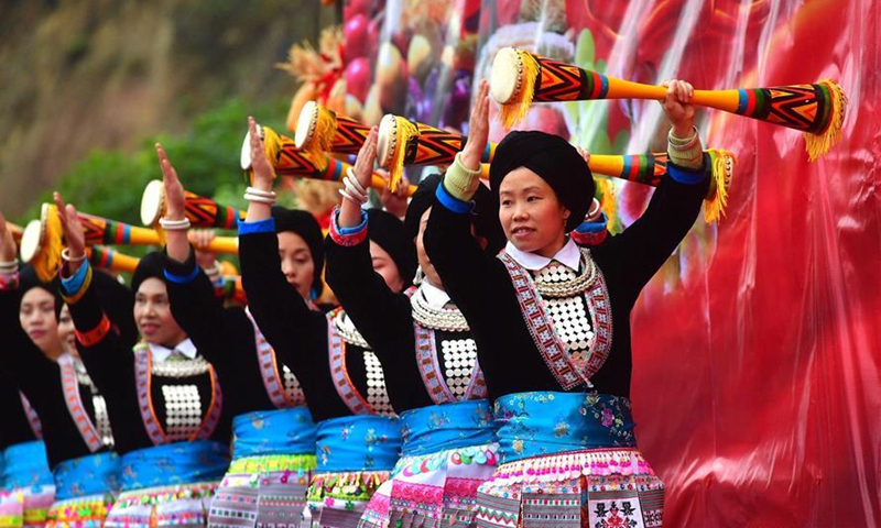 People of Yao ethnic group perform during harvest festival in Guangxi ...