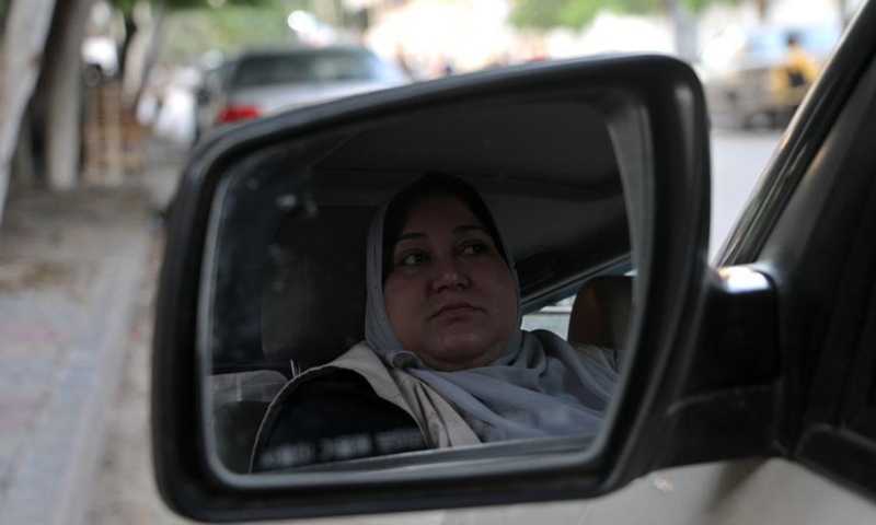 First female taxi driver in Gaza Strip starts taxi office to deliver ...