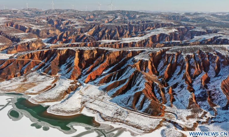 Aerial photo taken on Dec. 3, 2020 shows a view of the Mahuangliang Loess Geopark after snow in Yulin City, northwest China's Shaanxi Province.Photo:Xinhua