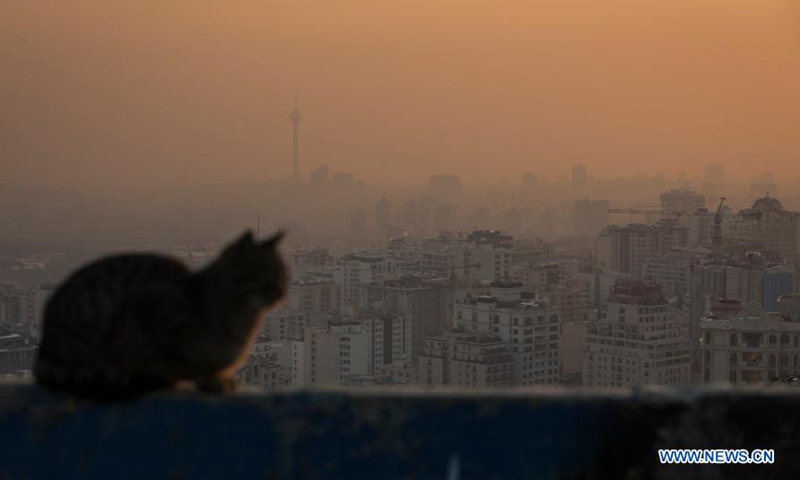 Buildings are shrouded in smog in Tehran, Iran, Dec. 27, 2020. (Photo by Ahmad Halabisaz/Xinhua)