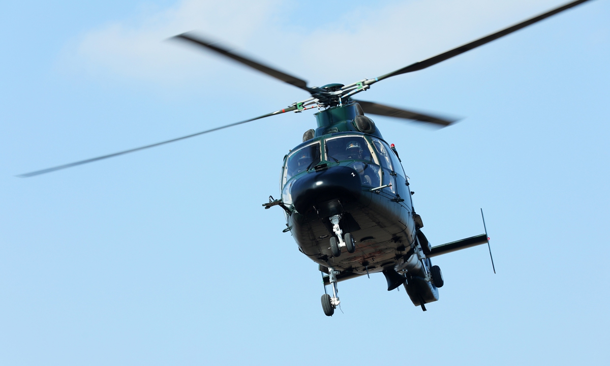 PAP service members manipulate attack helicopters in flight mission ...