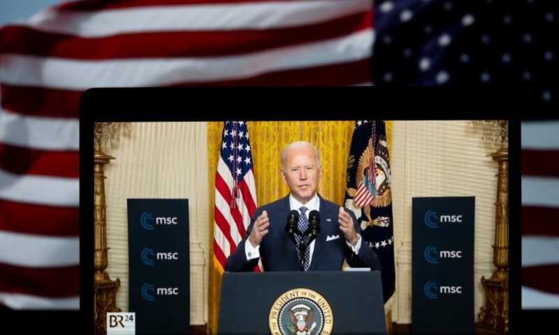 Photo taken in Arlington, Virginia, the United States, on Feb 19, 2021 shows a screen displaying U.S. President Joe Biden speaking in Washington, D.C. during a virtual event with the Munich Security Conference in a video provided by the U.S. State Department. Biden said on Friday that the United States is returning to the transatlantic partnership and will address global challenges like climate change and the COVID-19 pandemic.Photo:Xinhua