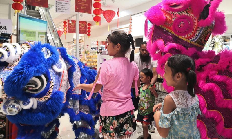 Children take part in an event to celebrate the upcoming Chinese Lantern Festival at a chain store of Jack's of Fiji in Suva, Fiji, Feb. 25, 2021. (Xinhua/Zhang Yongxing) 