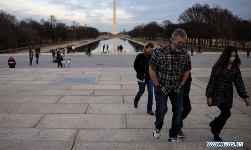 People tour the National Mall in Washington D.C., the United States, Feb. 27, 2021.Photo:Xinhua